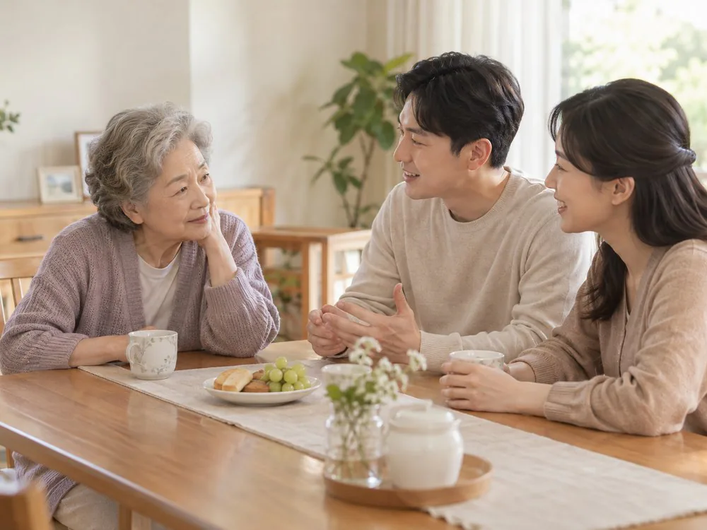 식탁에서 가족과 이야기를 나누는 모습